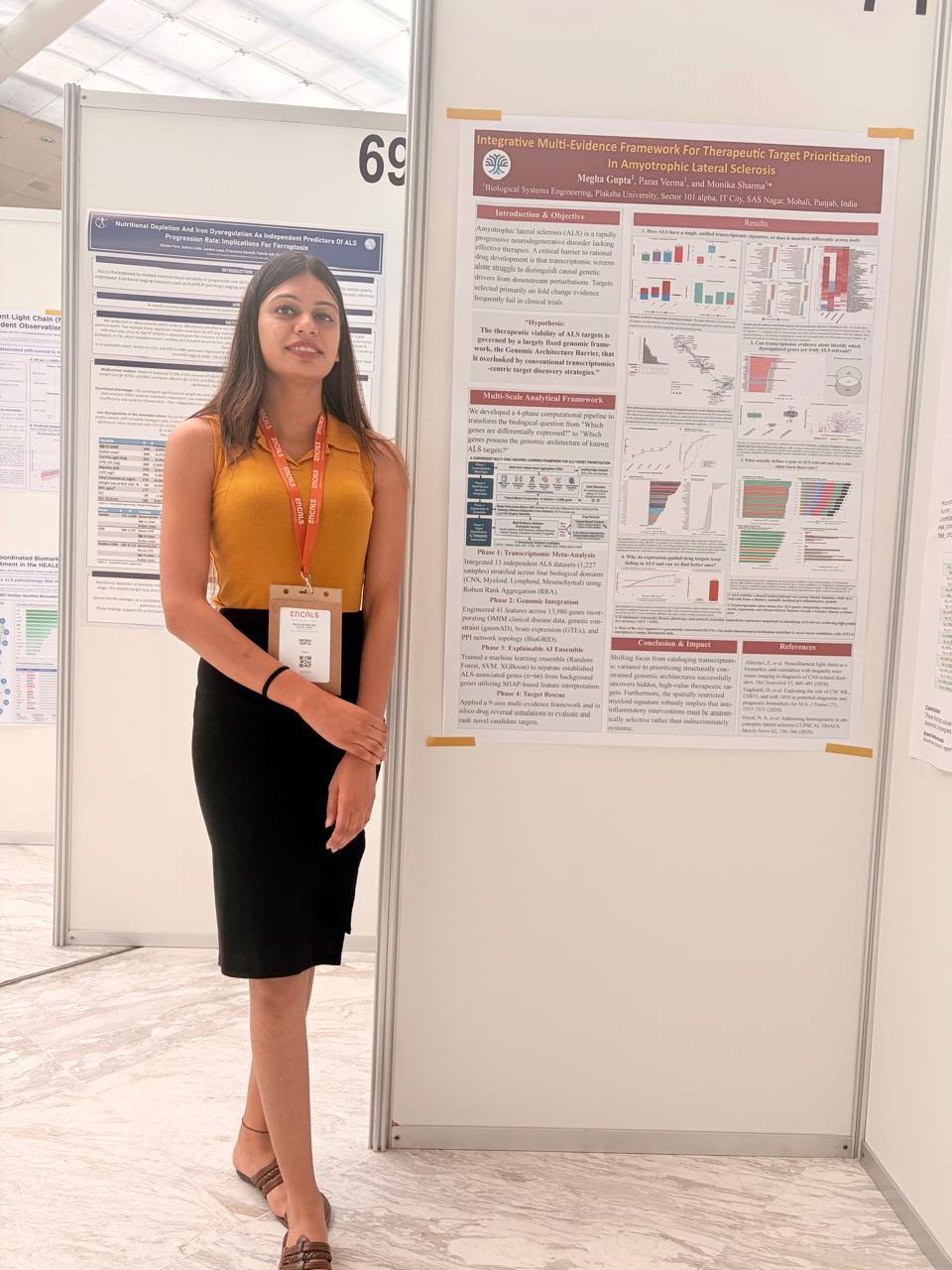 Megha presenting her poster at the ENCALS Meeting 2026 in Madrid